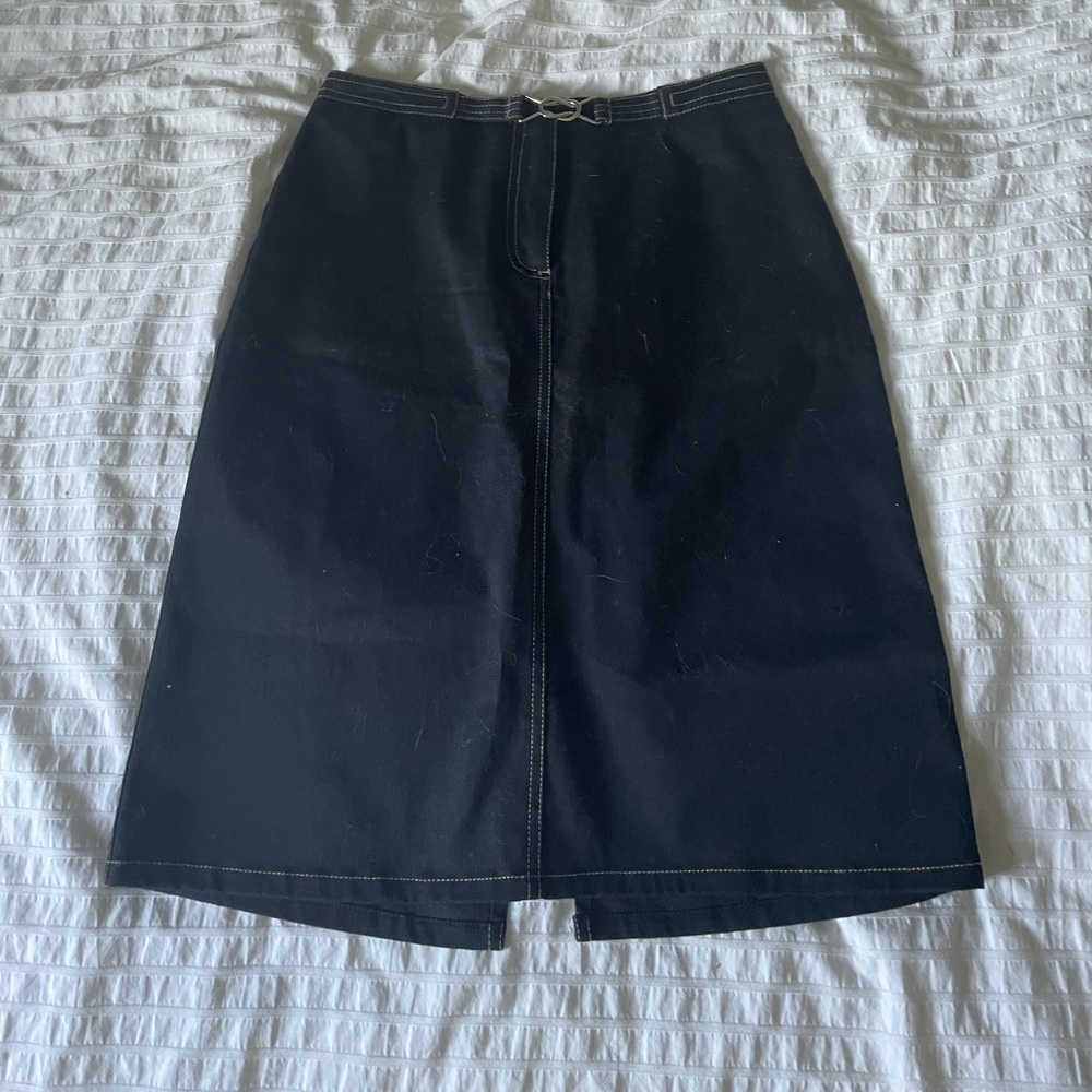 The limited black denim skirt